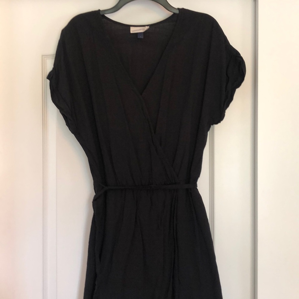 Black v-neck wrap dress. Midi length.